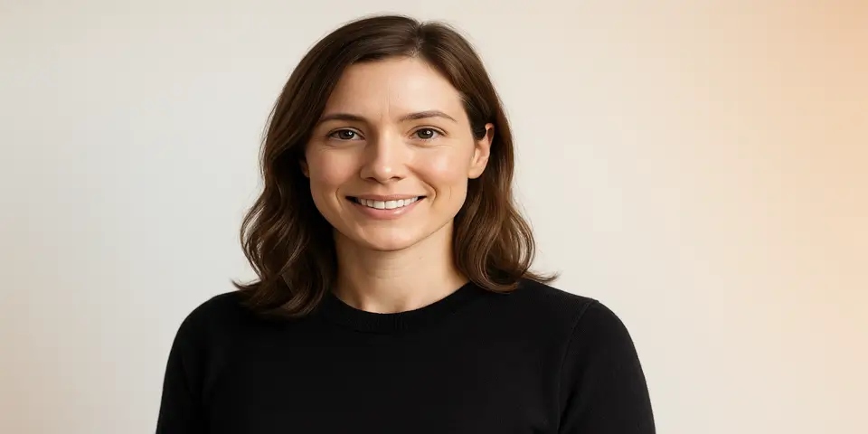 Confident professional woman reflecting personal brand impact"