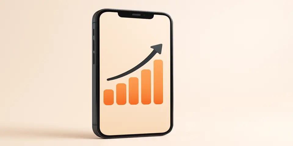 Smartphone displaying upward social media growth chart.
